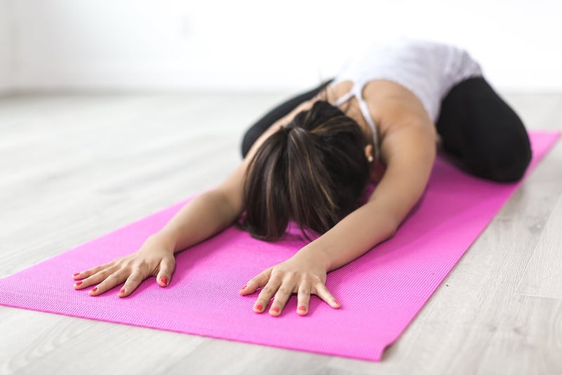 Woman practicing diaphragmatic breathing